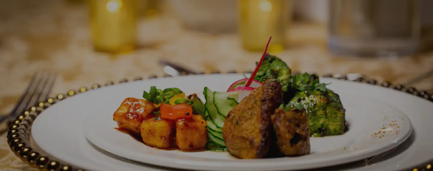 Plated main course at Meridian Grand — in-house event catering London.