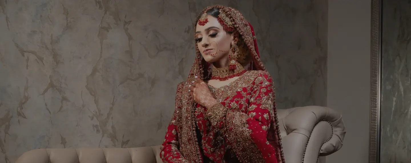 Bride in a red bridal dress at Meridian Grand — VIP suite wedding venue London.