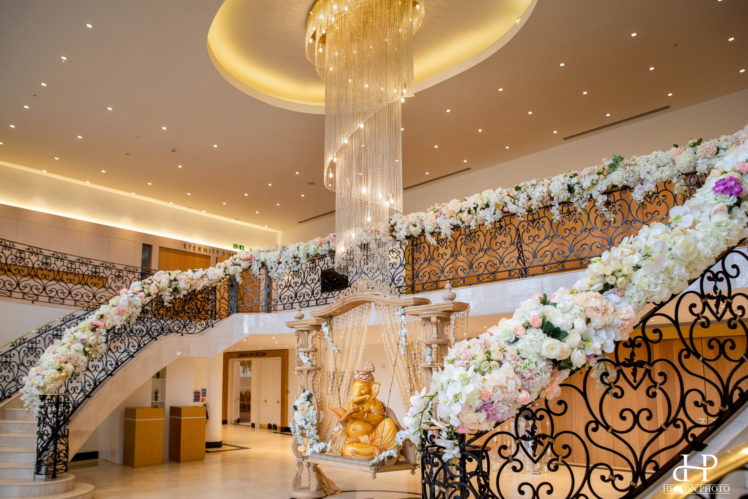 Somali wedding venue London — bride and groom on the couple-seating stage at Meridian Grand during the Aroos