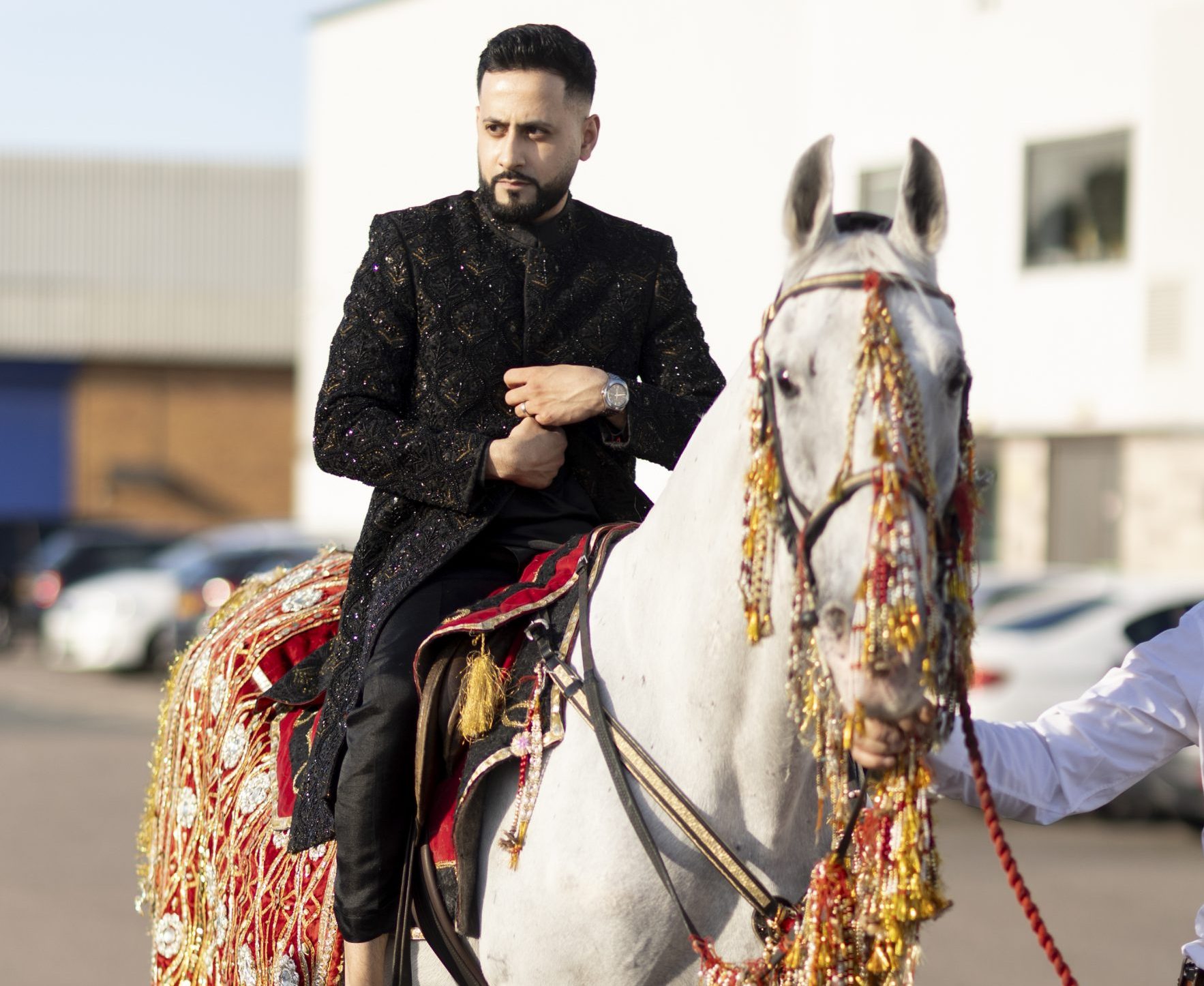Baraat entrance with dhol at Meridian Grand — Pakistani wedding venue London.