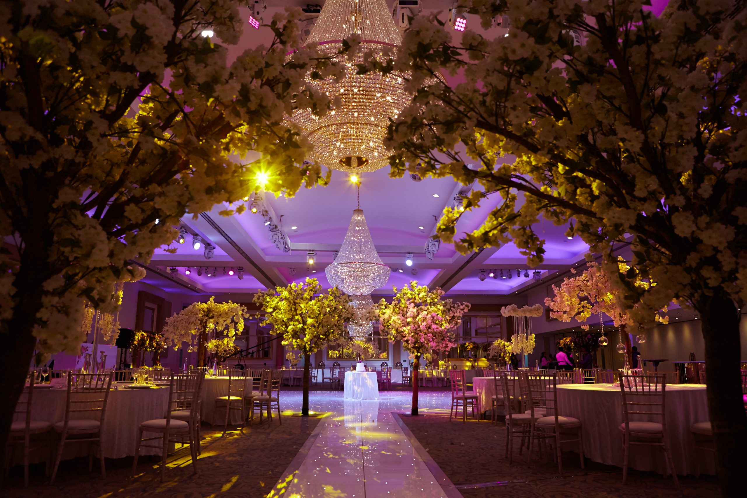 Somali wedding venue London — bride and groom on the couple-seating stage at Meridian Grand during the Aroos